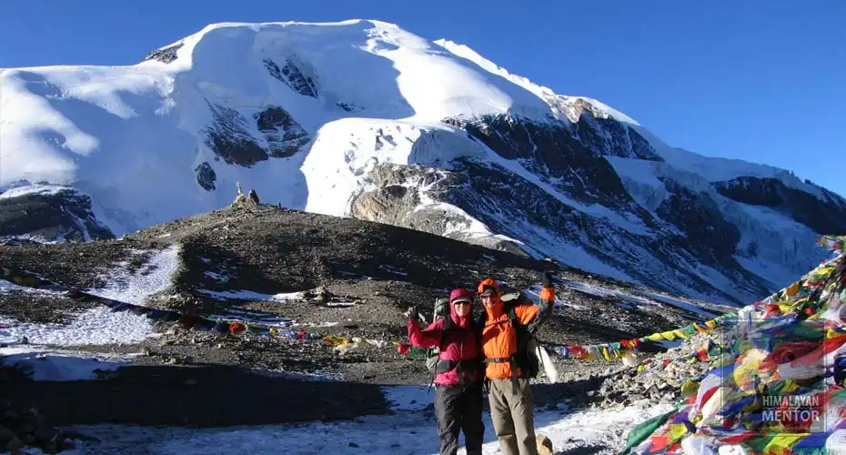 Trekkers are enjoying their successful climb to the top of Thorong La pass