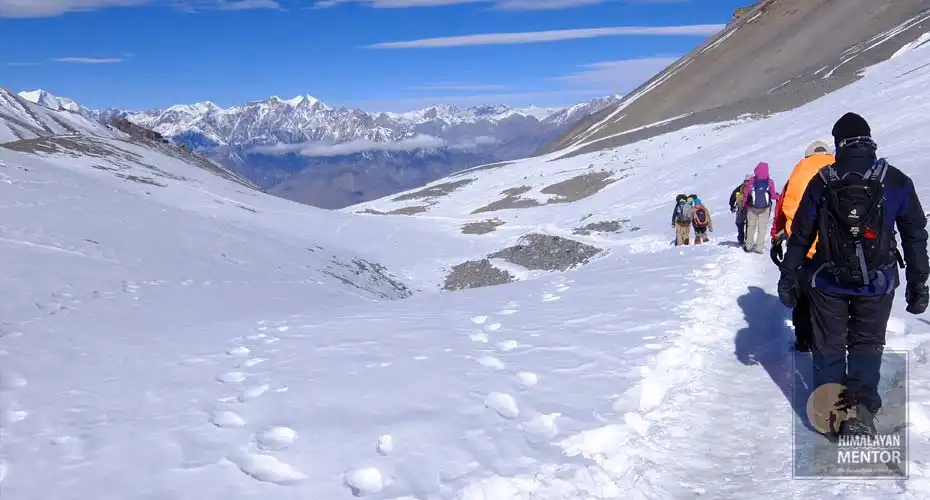 The toughest parts the trek, crossing the Thorong La pass on snowy path