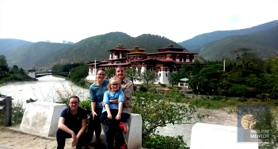Our clients are posing for a photograph at Punakha
