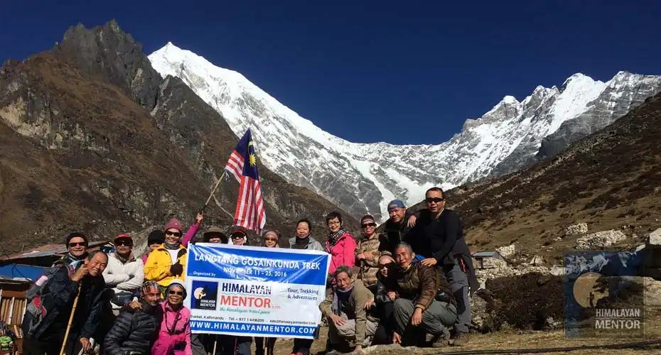 Group photo at Kyangjin Gompa with trekkers