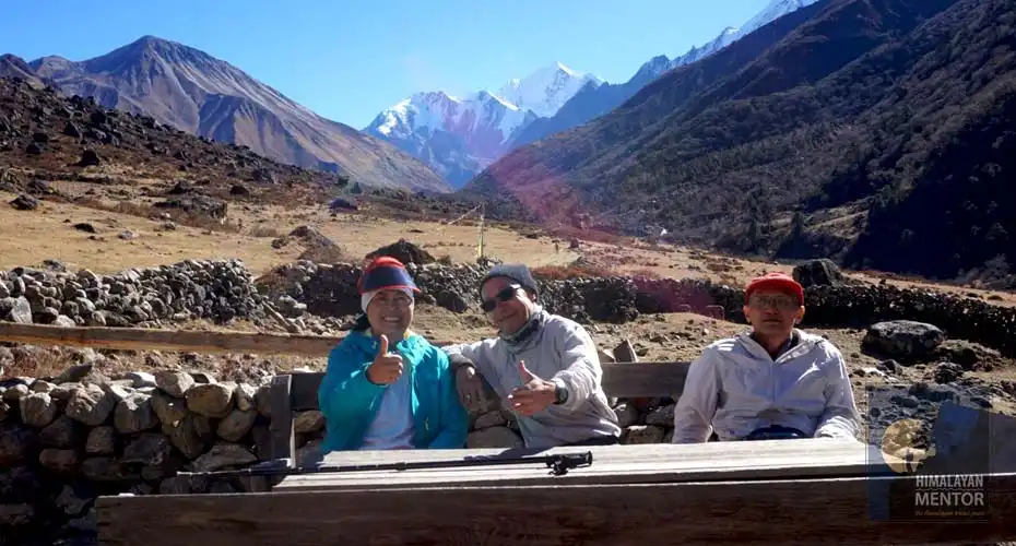 Trekkers are taking a lunch break at Langtang village