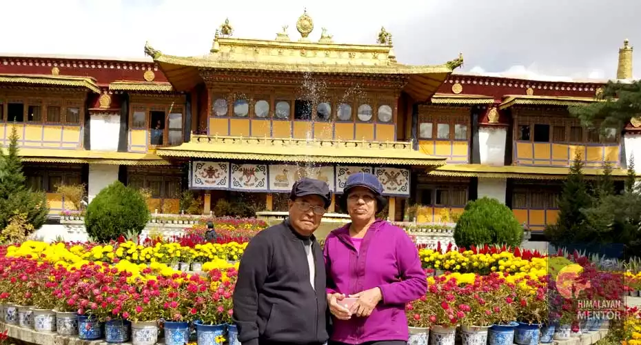 Our clients from the US posing for a photograph at Norbulingka Palace, Lhasa