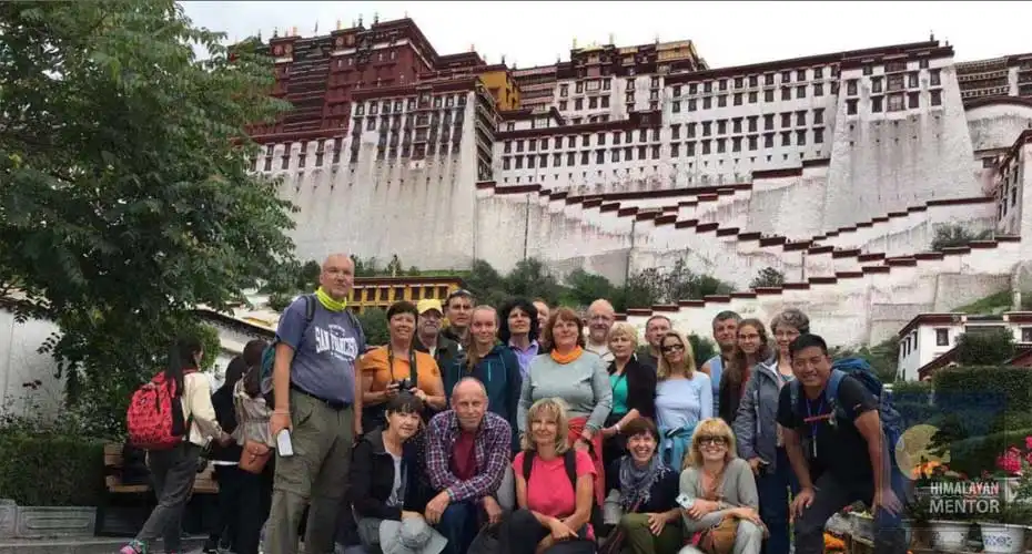 Group photo in front of sacred Potala Palace in Lhasa 