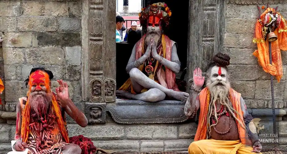 The Sadhus are posing for a photograph at Pashupatinath temple, Kathmandu