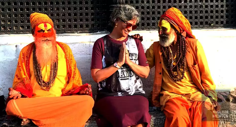 Client from Brazil enjoying to take a blessing from Sadhus in Pashupatinath temple. 