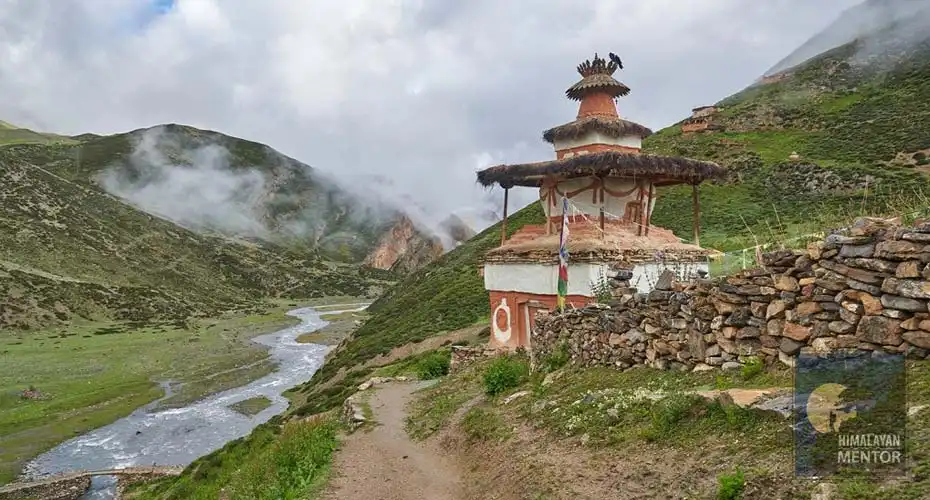 Small Buddhist Chorten & stream along the way of trekking trail